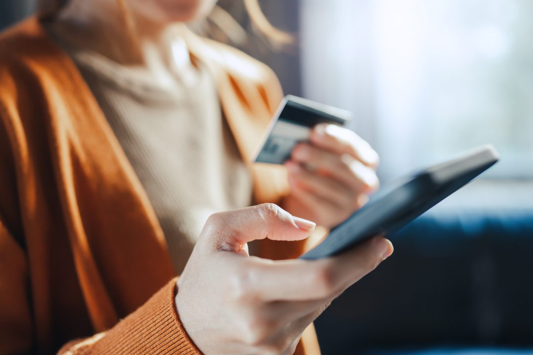 Online payment, Hands of woman holding a credit card and using s